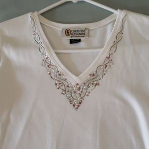 Top with pink and silver rhinestones. And pearls.